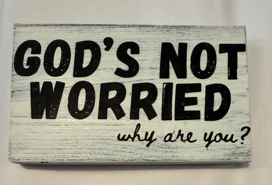 God’s Not Worried Wooden Sign