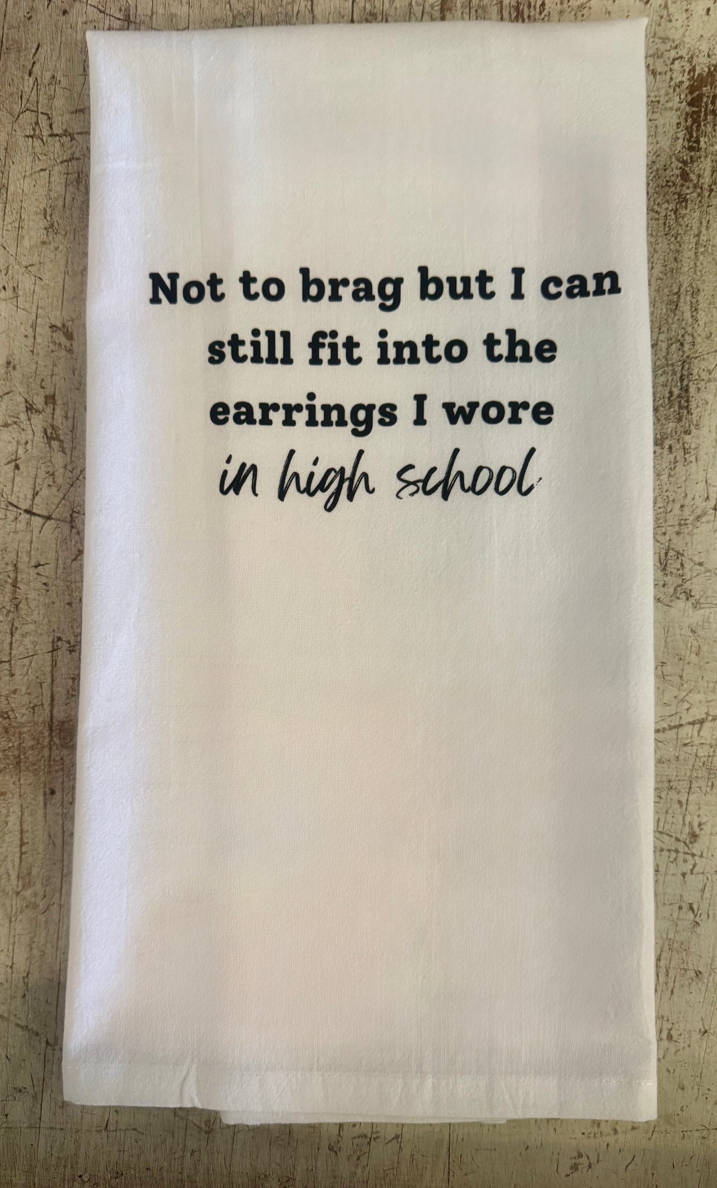 Earrings in high school Tea Towel